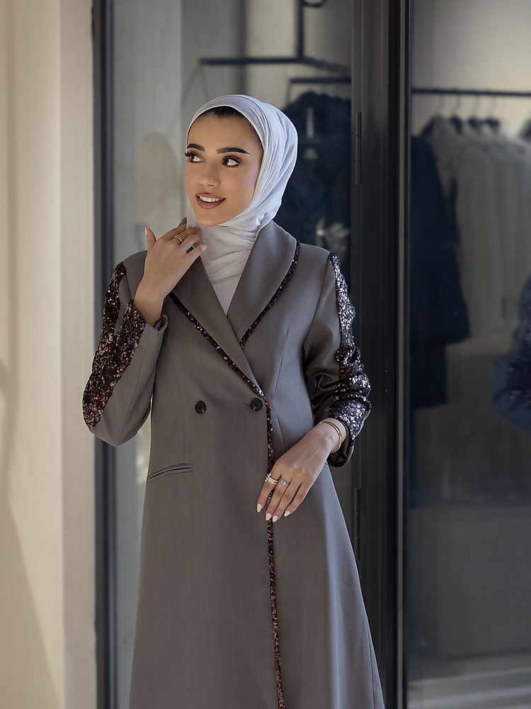 Long grey double-breasted coat with sequin-embellished sleeves