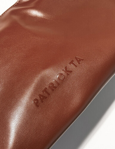 The elevated beauty bag in brown