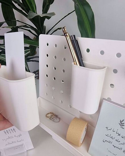 منظم مكتب مع مجموعة العبارات الإيجابية