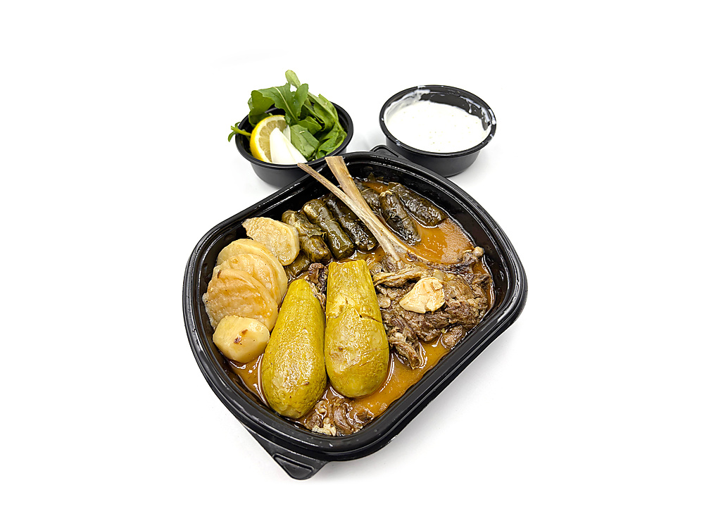 Grape leaves with zucchini & lamb chops