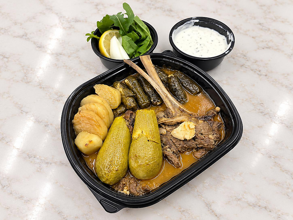 Grape leaves with zucchini & lamb chops