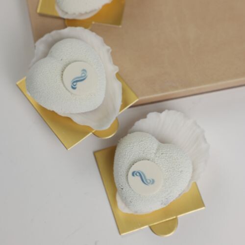 Mini heart mousse cake in a flower patel