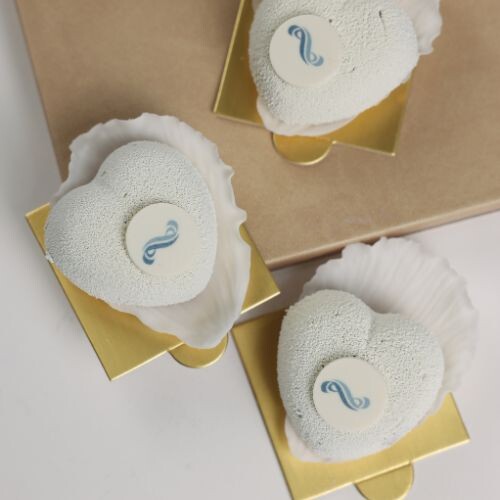 Mini heart mousse cake in a flower patel