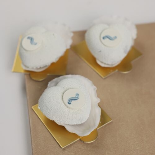 Mini heart mousse cake in a flower patel