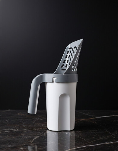 مغرفة رمل للقطط