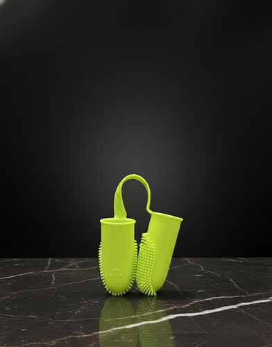 فرشاة اسنان بأصبعين