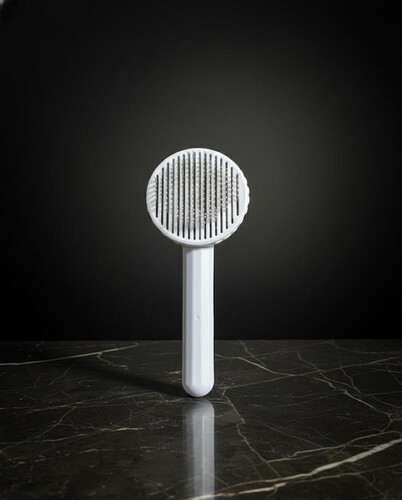 اداة عناية بالقطط والكلاب