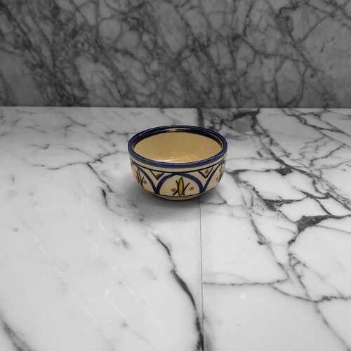 صحن فخار صغير رسم يدوي