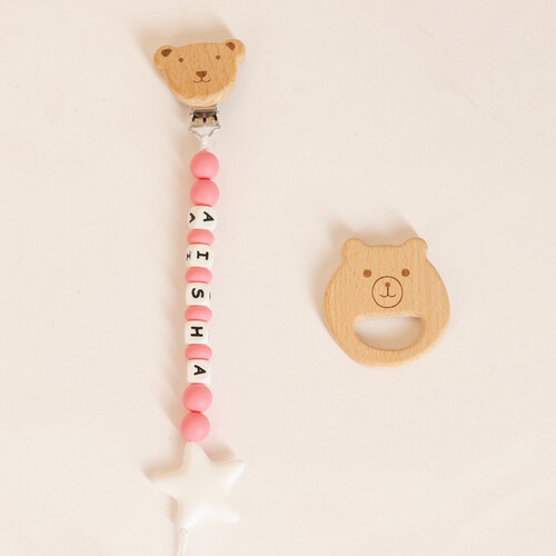 A girl's set consisting of (3box,pacifier hanger ,wooden toy, bunny , overall, blanket and head cup)