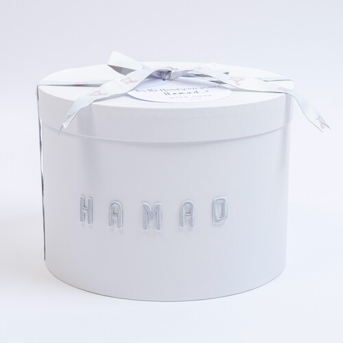 A boy set consisting of (1box,pacifier hanger ,wooden toy, bunny , pajama)